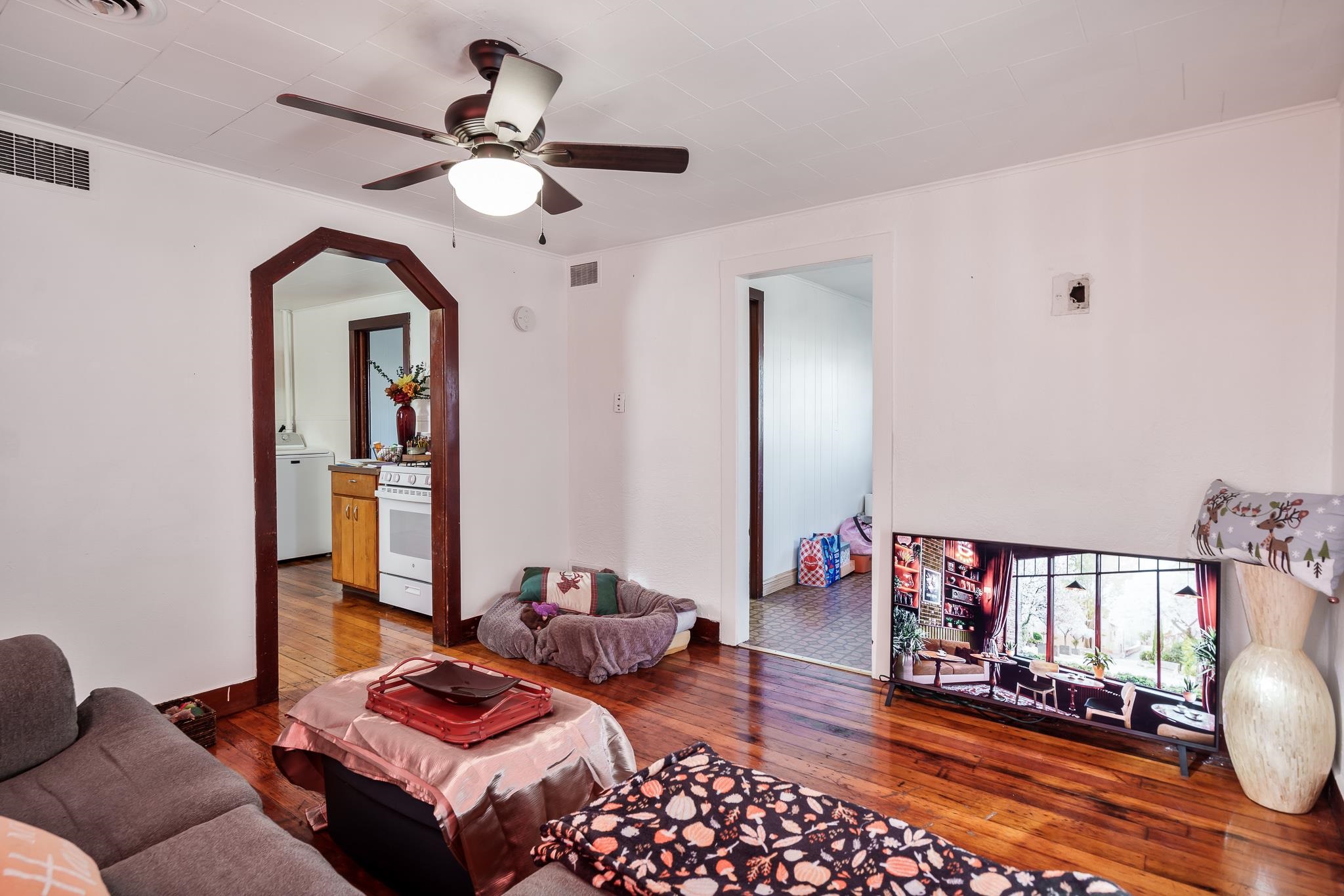 827 Sawyer Road Rockford, IL 61109 - Photo 5 of 24 a bedroom with bed and wooden floor