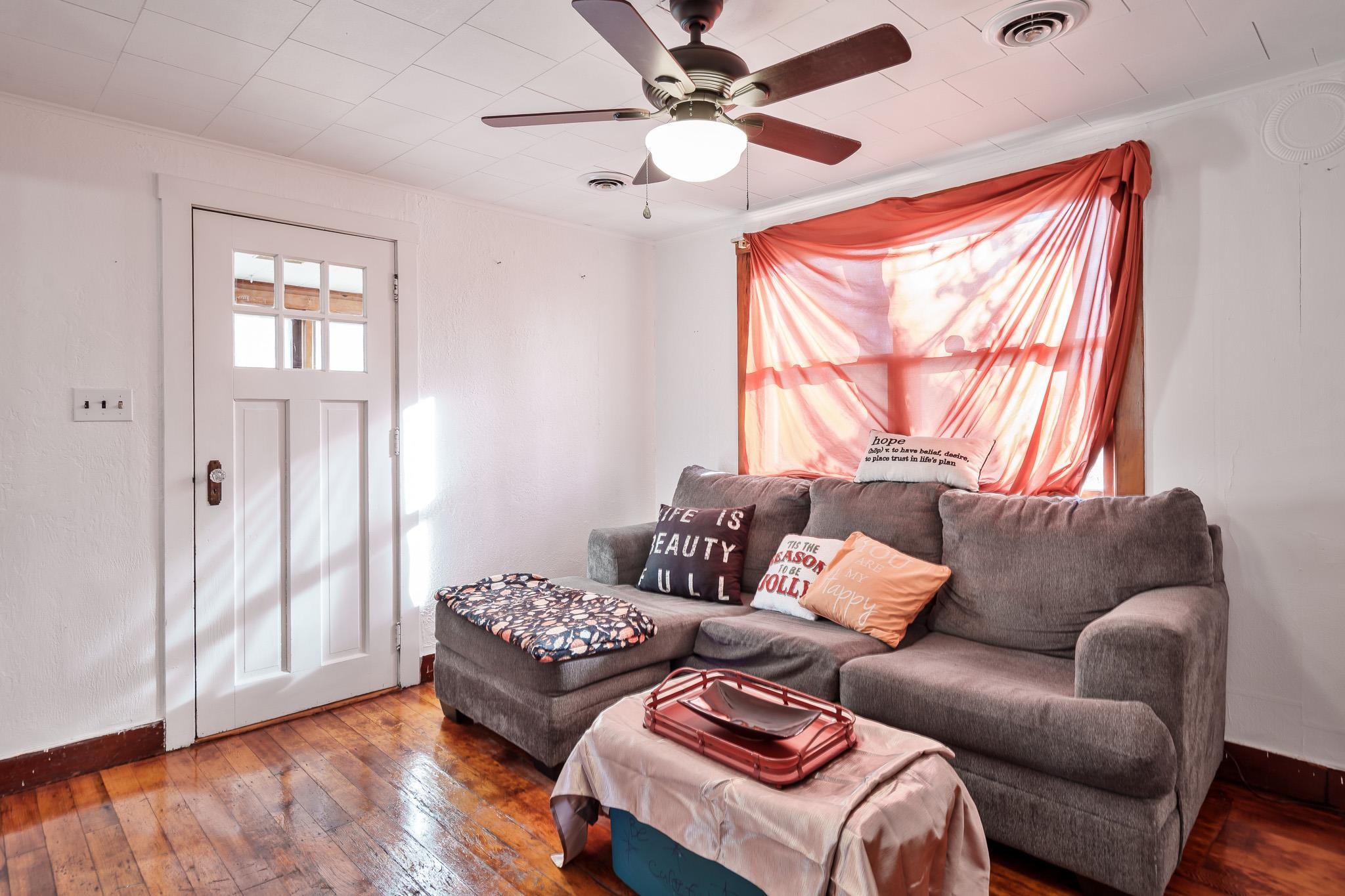 827 Sawyer Road Rockford, IL 61109 - Photo 7 of 24 a living room with furniture and a window