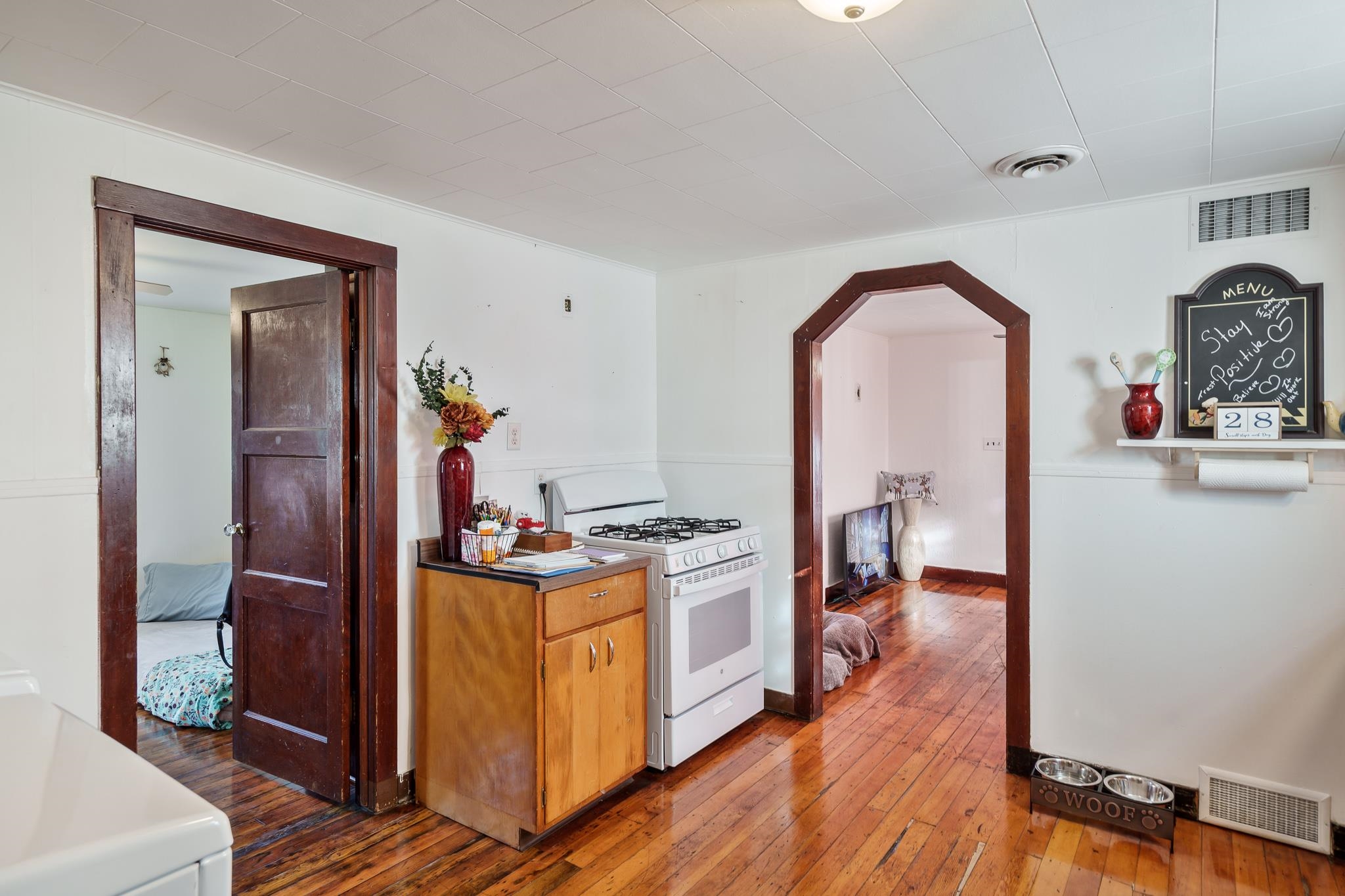 827 Sawyer Road Rockford, IL 61109 - Photo 10 of 24 a view of a kitchen with a sink and wooden floor