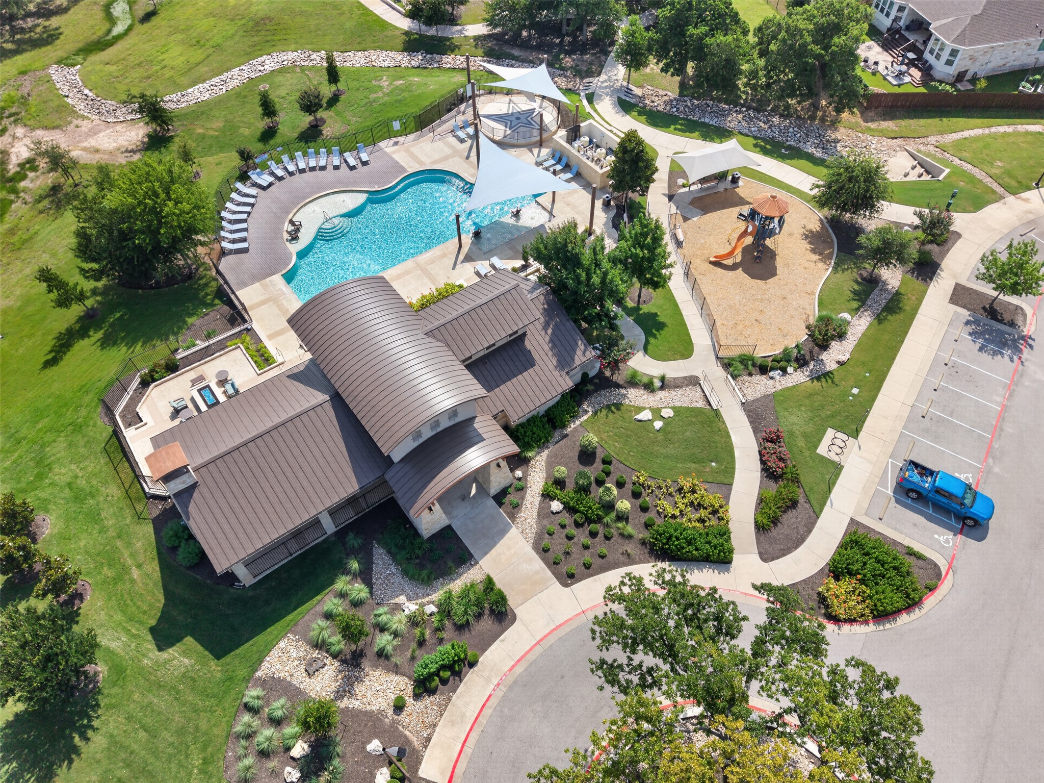 1009 Bright Star Cove Georgetown, TX 78628 - Photo 34 of 40 an aerial view of a house with a yard and outdoor seating