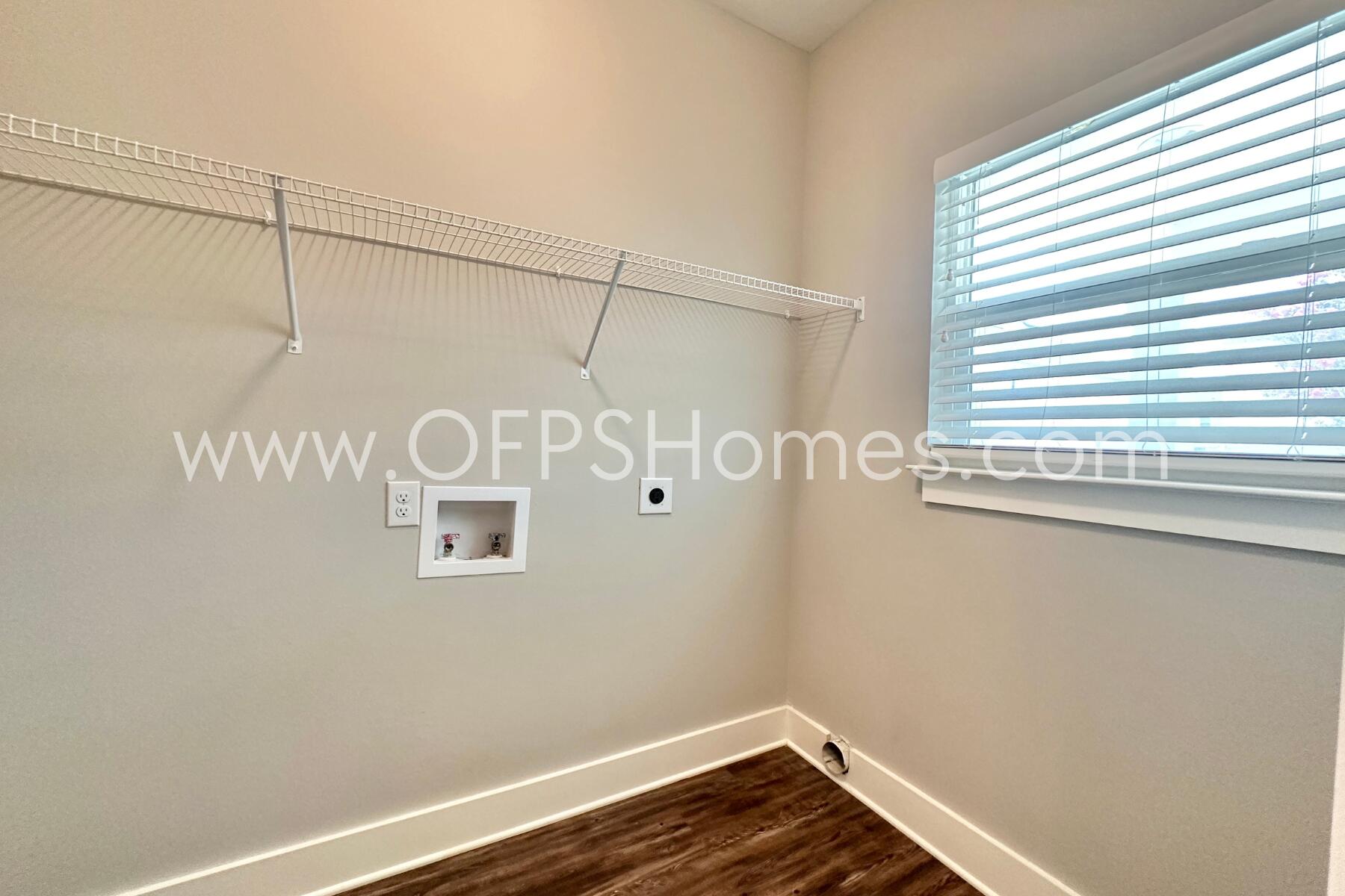 400 Mattie M Kelly Boulevard, Unit 54 Destin, FL 32541 - Photo 13 of 29 a view of a room with racks on the wall