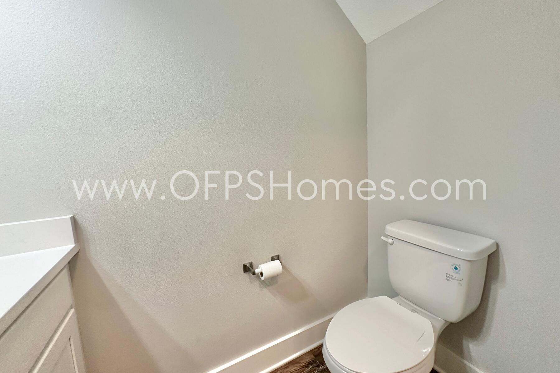 400 Mattie M Kelly Boulevard, Unit 54 Destin, FL 32541 - Photo 16 of 29 a white toilet sitting next to a white sink