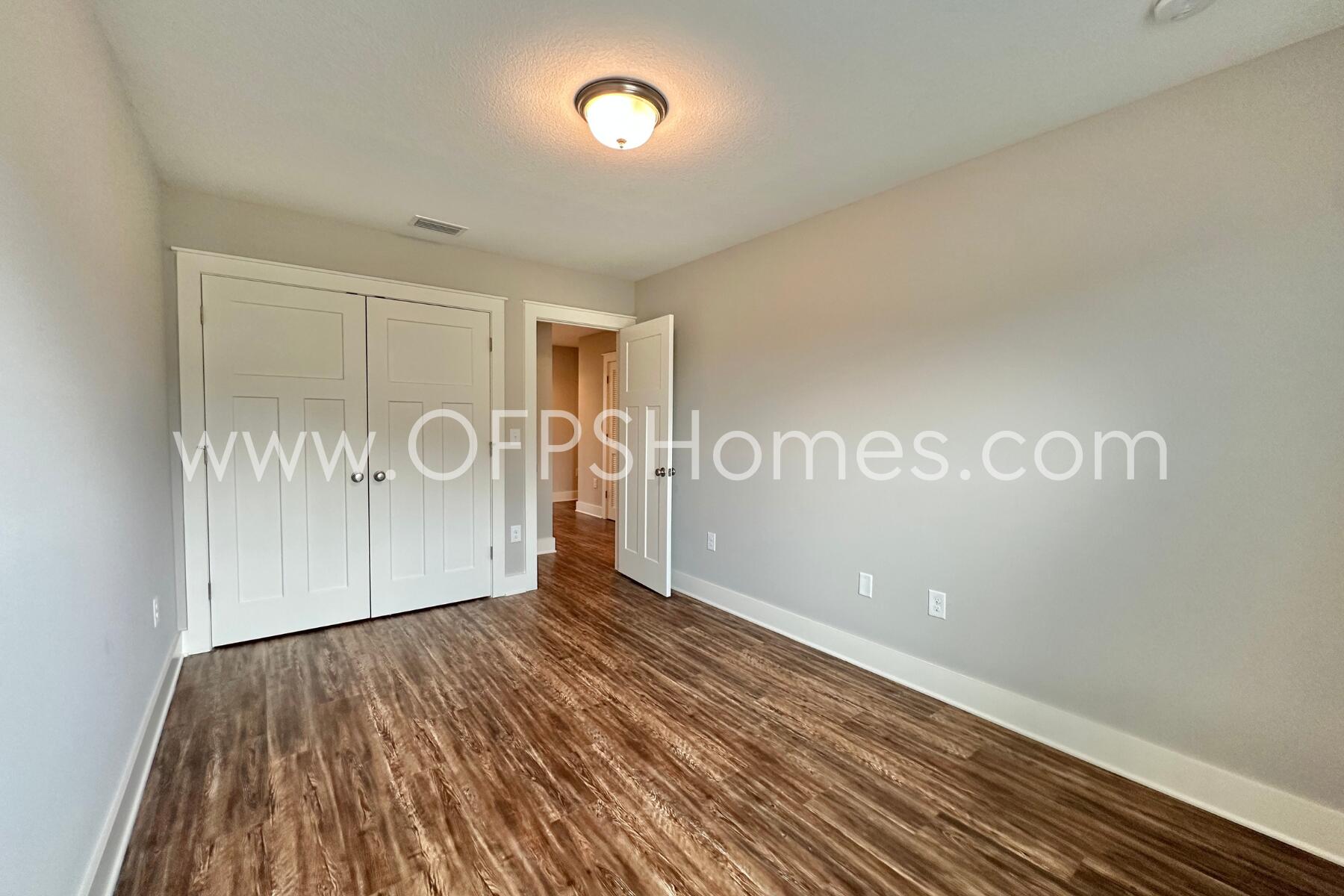 400 Mattie M Kelly Boulevard, Unit 54 Destin, FL 32541 - Photo 29 of 29 a view of a room with wooden floor and white walls