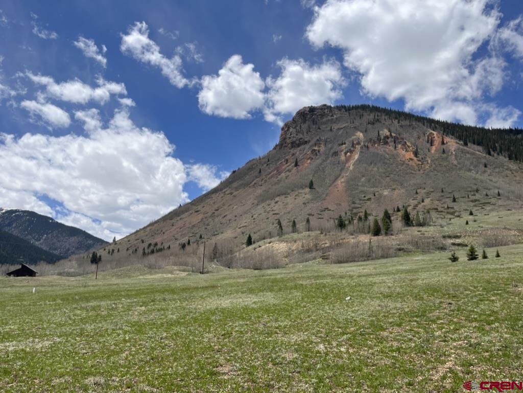 16 Bluff Street Silverton, CO 81433 - Photo 6 of 12 a backyard of a house with lots of green space