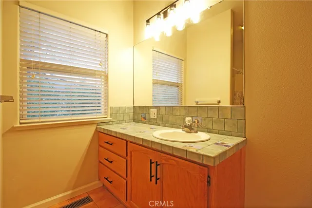 a bathroom with a sink and a toilet