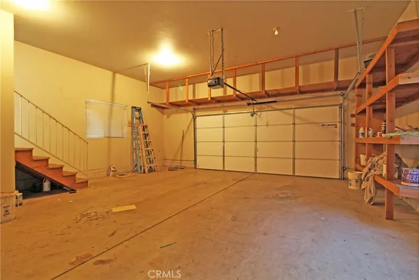 a view of a room with racks on the wall