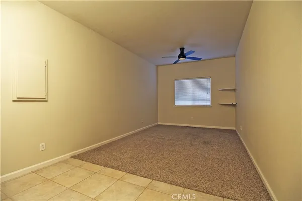 a view of a room with an empty space