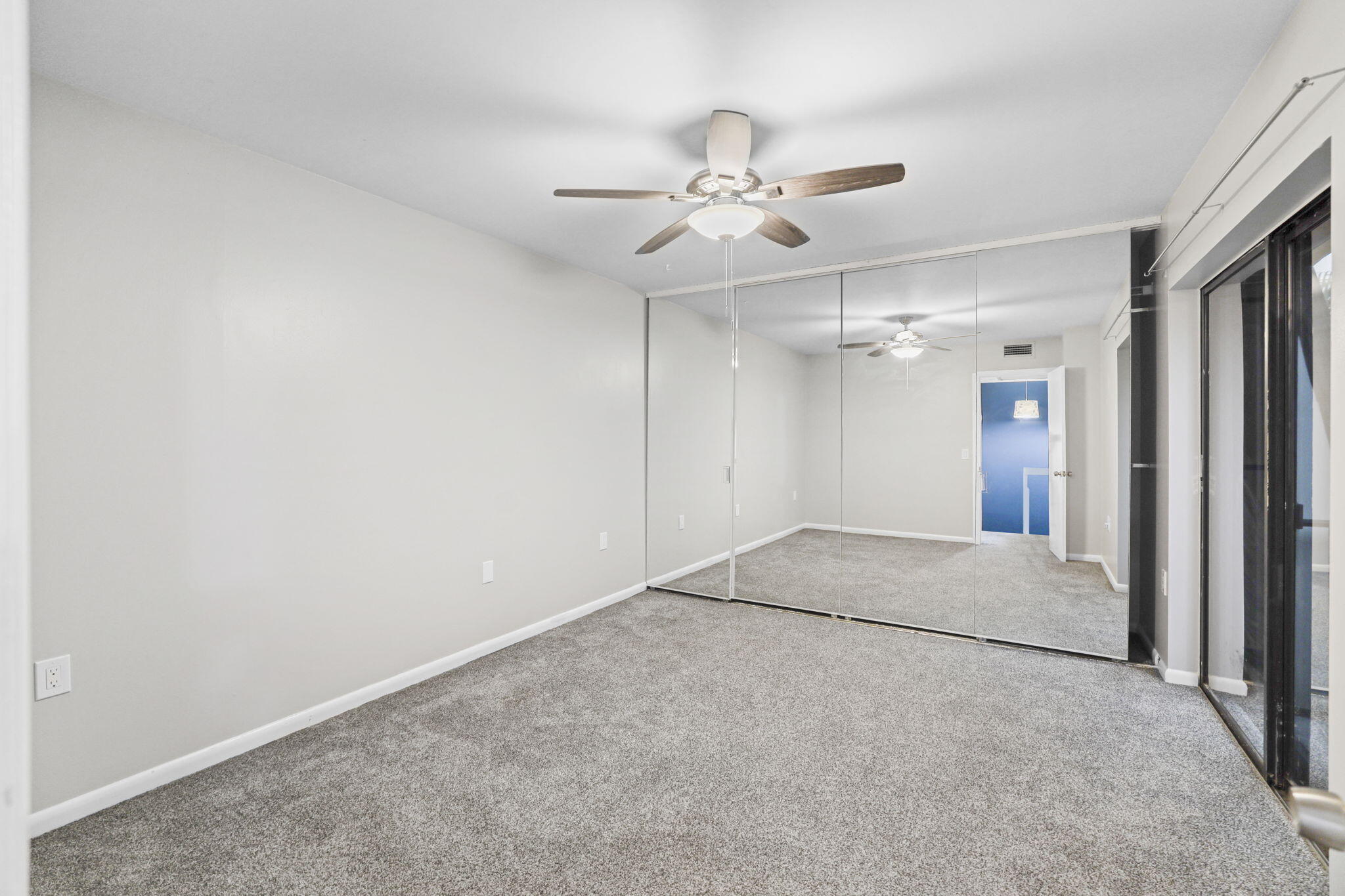 617 6th Lane Palm Beach Gardens, FL 33418 - Photo 28 of 49 an empty room with fan and windows