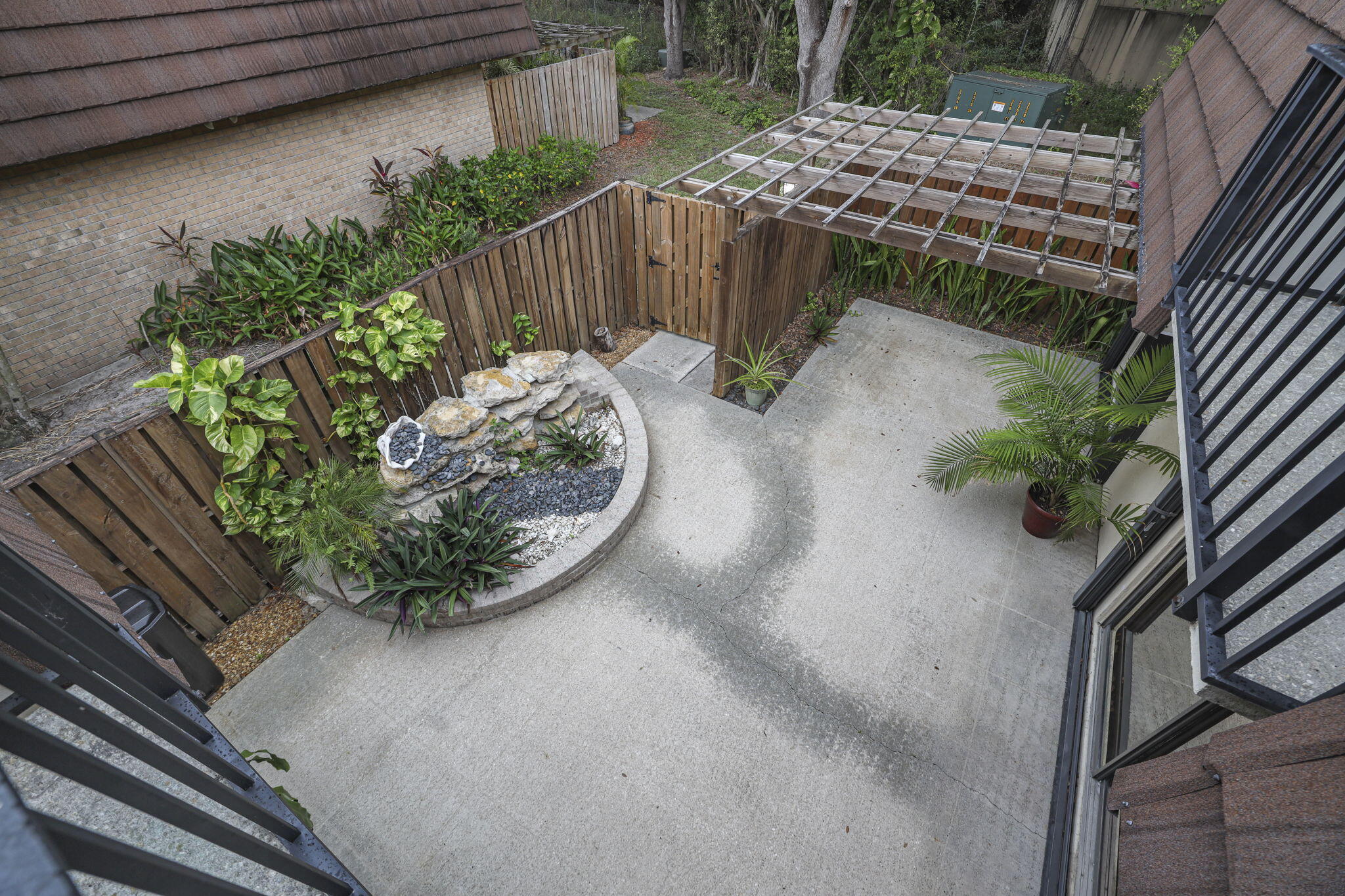 617 6th Lane Palm Beach Gardens, FL 33418 - Photo 38 of 49 a view of a backyard with plants