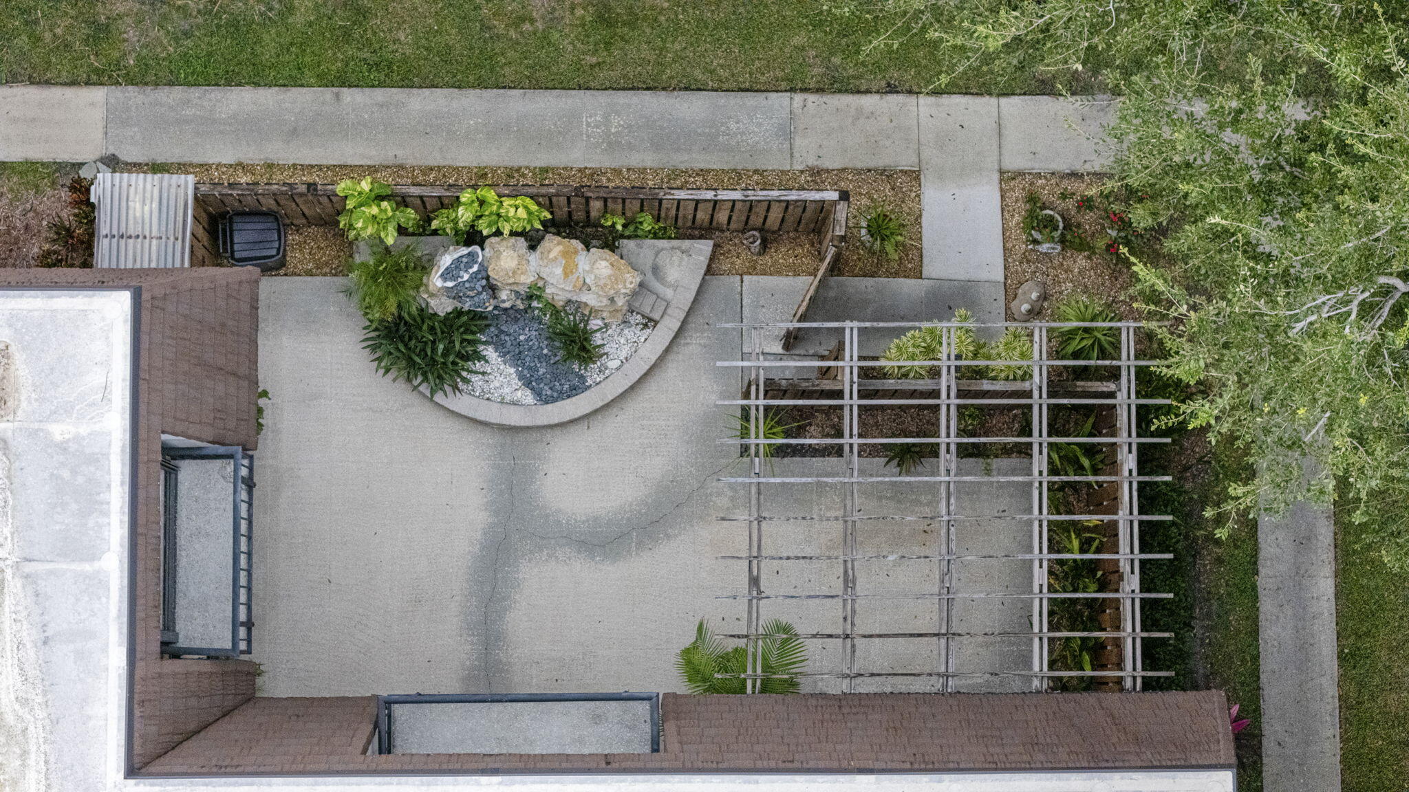 617 6th Lane Palm Beach Gardens, FL 33418 - Photo 39 of 49 a front view of a house with plants