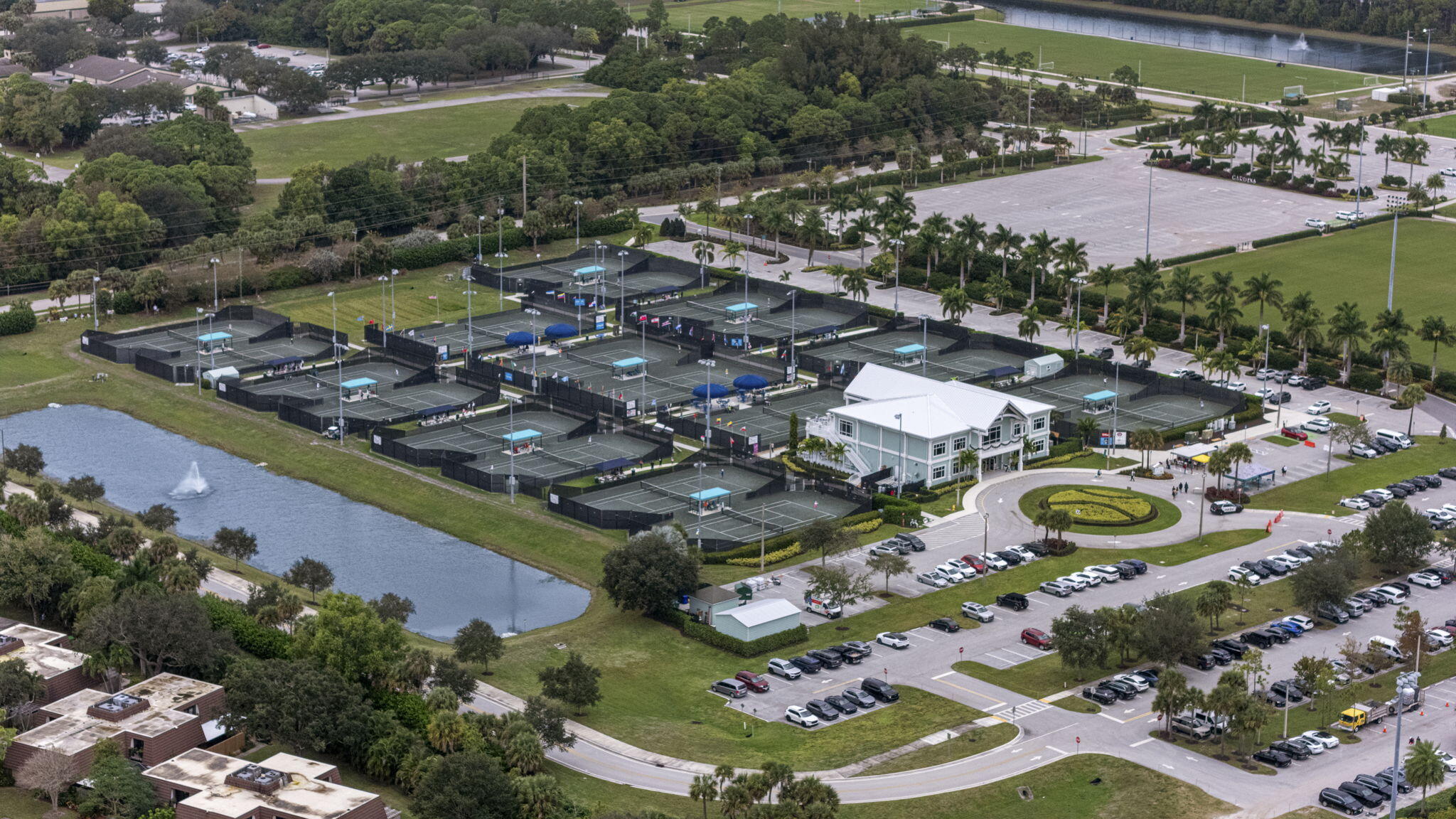 617 6th Lane Palm Beach Gardens, FL 33418 - Photo 43 of 49 an aerial view of residential houses with outdoor space