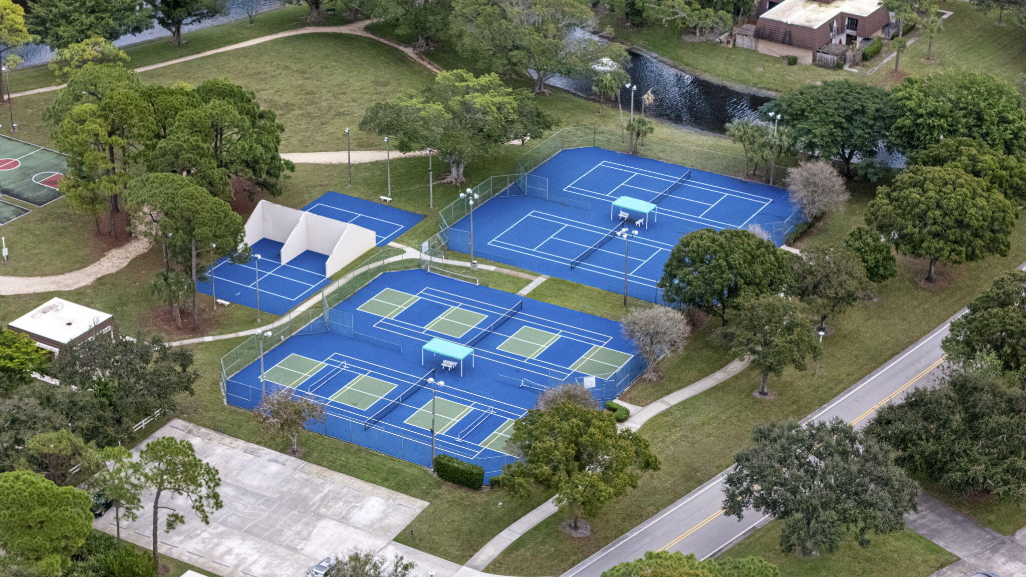 617 6th Lane Palm Beach Gardens, FL 33418 - Photo 46 of 49 an aerial view of a house with a yard