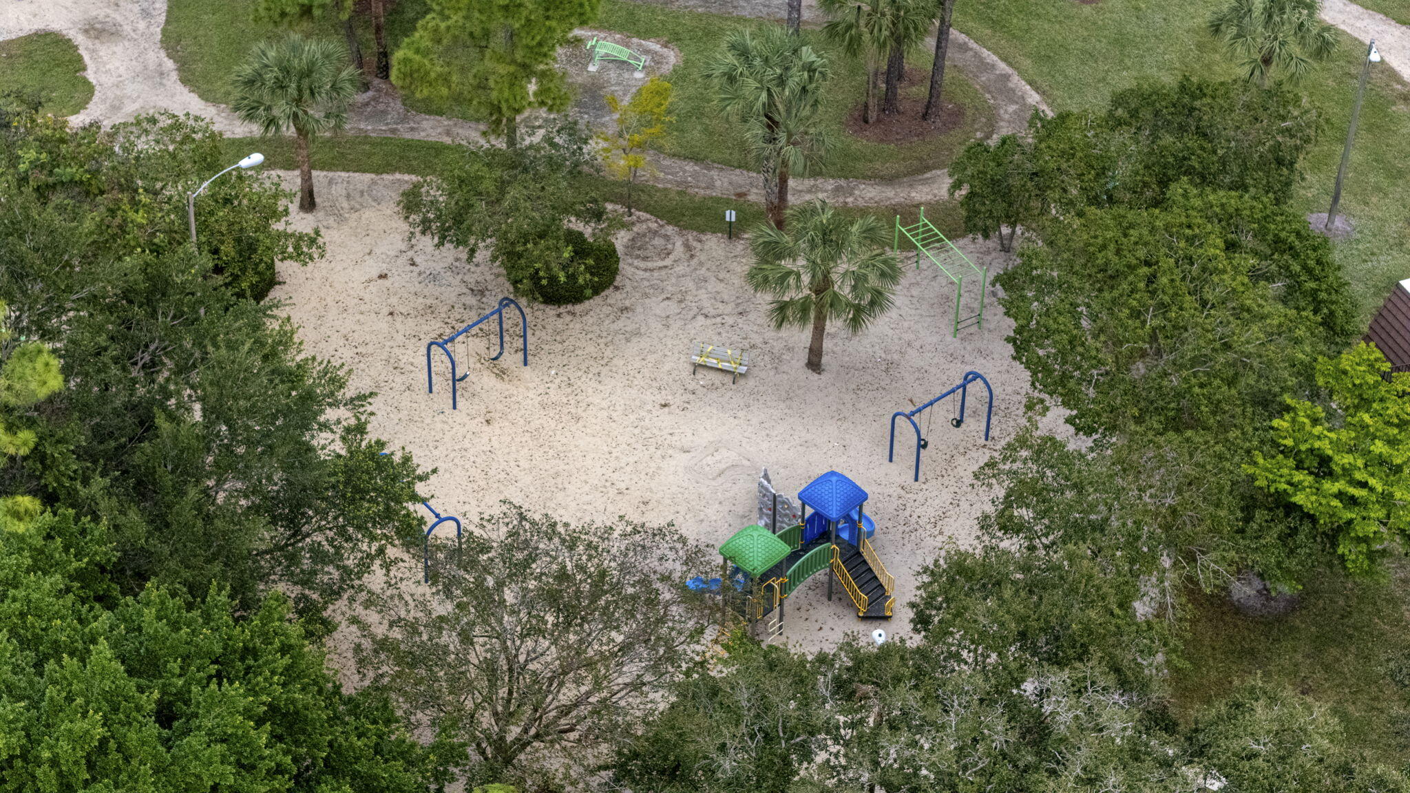 617 6th Lane Palm Beach Gardens, FL 33418 - Photo 48 of 49 an aerial view of a house with a yard