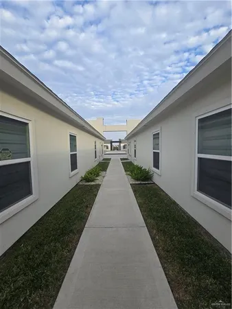 a view of a back yard of the house