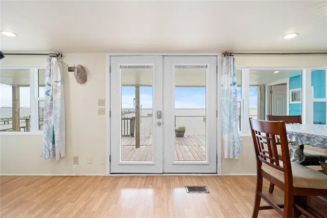 a view of kitchen with furniture and wooden floor
