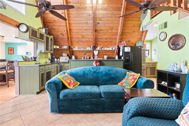 a outdoor living space with furniture and a fireplace