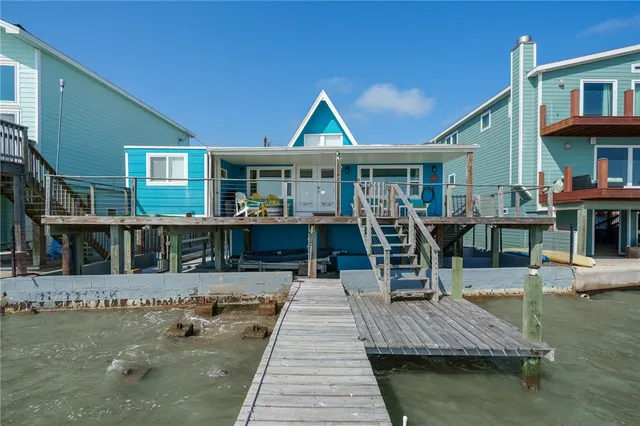 a front view of a house with swimming pool