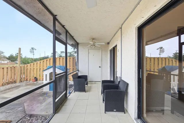 a view of a backyard with a patio
