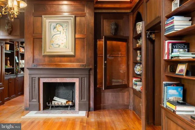 a view of living room and a fireplace