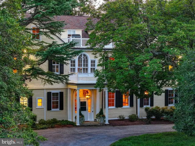 a view of a livingroom with furniture window and fire place