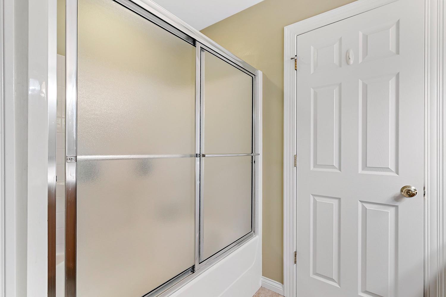 365 Cottage View Terrace Valparaiso, IN 46383 - Photo 13 of 17 a bathroom with a glass shower door
