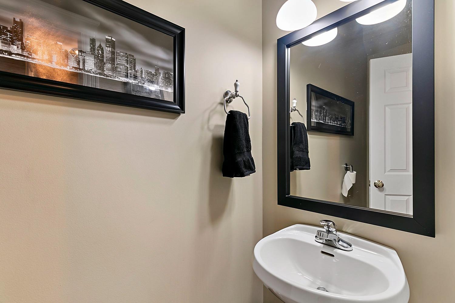 365 Cottage View Terrace Valparaiso, IN 46383 - Photo 14 of 17 a bathroom with a sink and a mirror