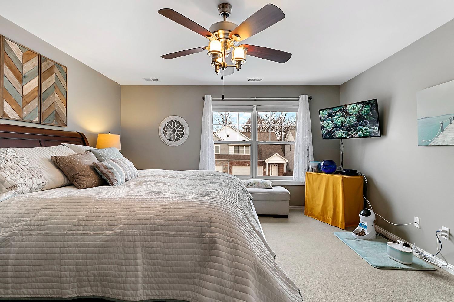 365 Cottage View Terrace Valparaiso, IN 46383 - Photo 10 of 17 a bedroom with a bed and a chandelier