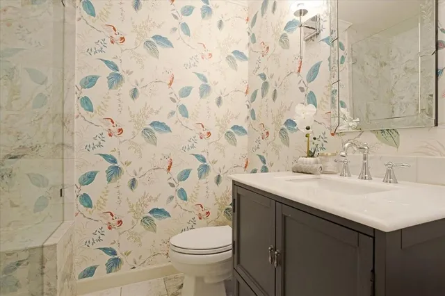 a bathroom with a sink and a toilet