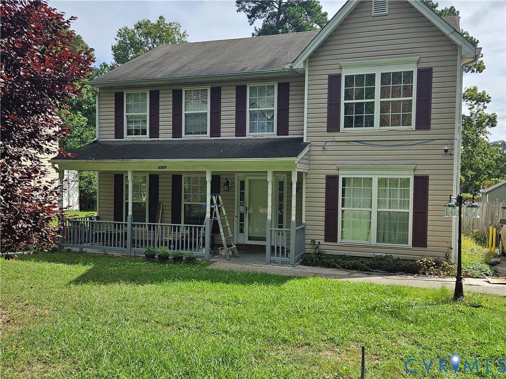 1307 Spruance Road Richmond, VA 23225 - Photo 1 of 7 Two-story exterior with light-colored siding, cont