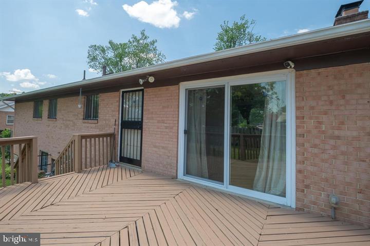 6311 Barrs Lane Lanham, MD 20706 - Photo 42 of 54 a view of a house with a balcony