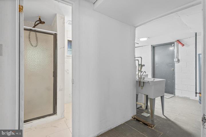 6311 Barrs Lane Lanham, MD 20706 - Photo 44 of 54 a view of a bathroom with a sink and mirror