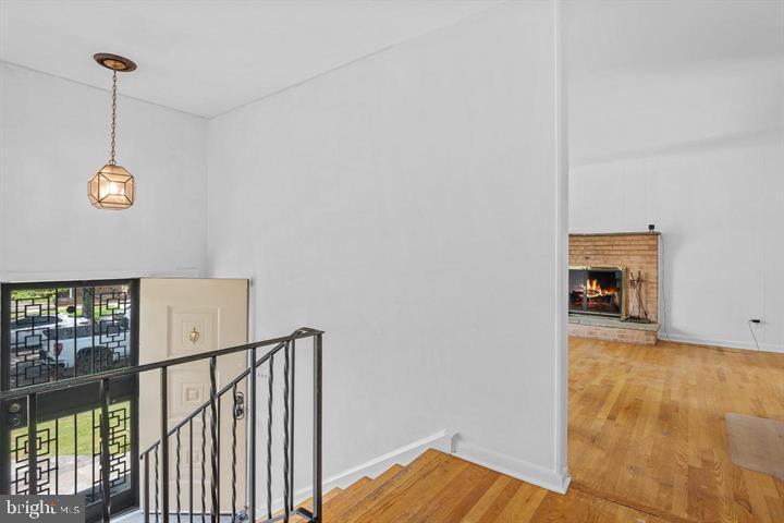 6311 Barrs Lane Lanham, MD 20706 - Photo 53 of 54 a view of a room with wooden floor and fan