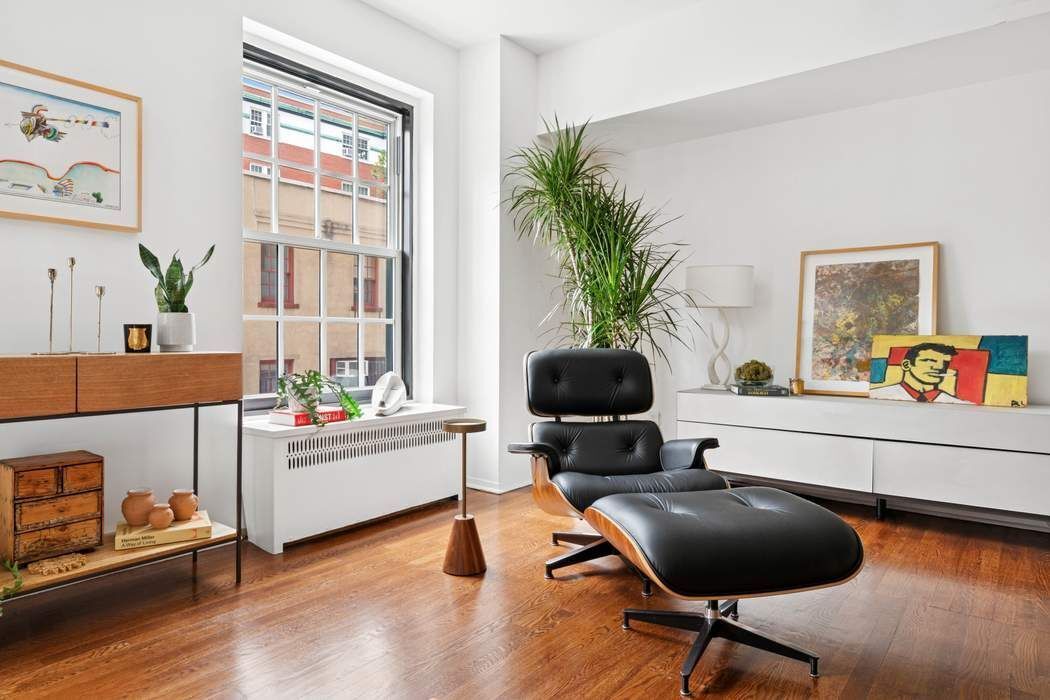 1 5th Avenue, Unit 2J Manhattan, NY 10003 - Photo 4 of 19 a work room with furniture and a potted plant