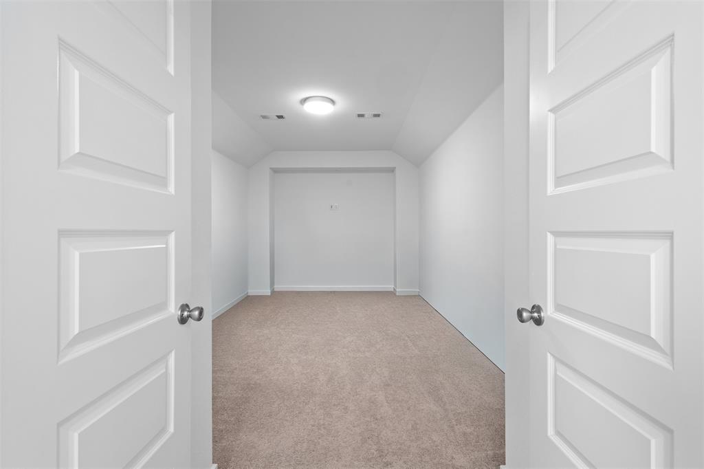 1136 Saddle Ridge Drive Aubrey, TX 76227 - Photo 18 of 26 a view of an empty room