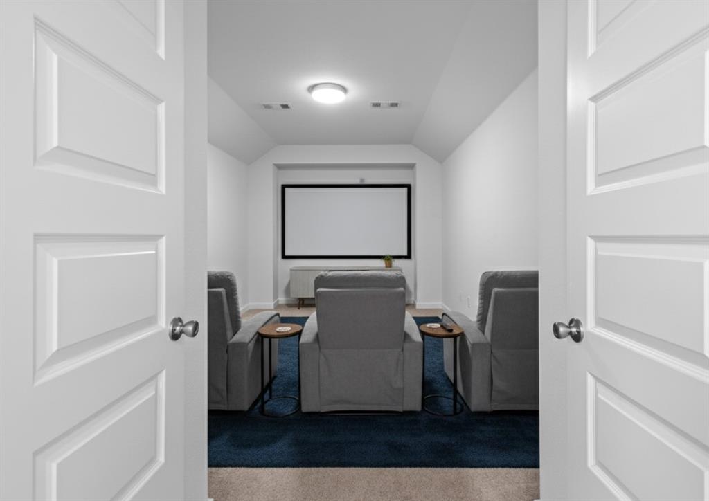 1136 Saddle Ridge Drive Aubrey, TX 76227 - Photo 19 of 26 a room with wooden floor and windows