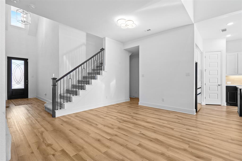 1136 Saddle Ridge Drive Aubrey, TX 76227 - Photo 9 of 26 a view of entryway with wooden floor