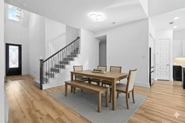 a bed room with a bed and a table