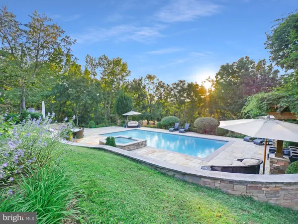 a front view of a brick house with a yard