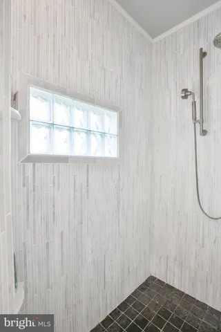 a view of a storage & utility room with washer and dryer