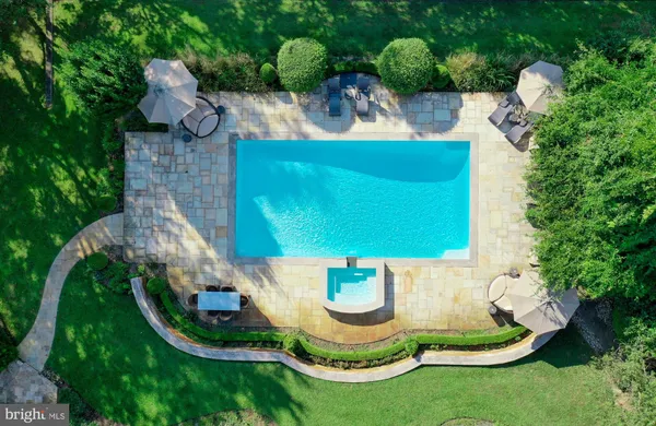 a view of a balcony with wooden fence