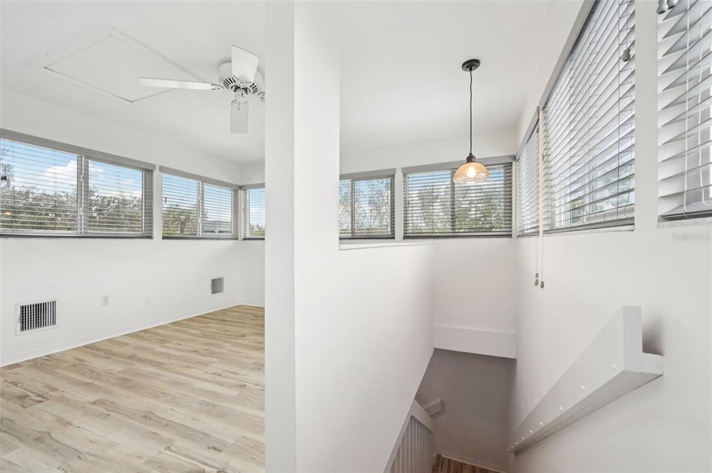 13221 North Branch Road Sarasota, FL 34240 - Photo 35 of 64 a view of a room with a window and wooden floor