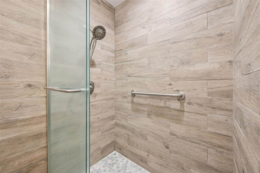 13221 North Branch Road Sarasota, FL 34240 - Photo 42 of 64 a bathroom with a shower
