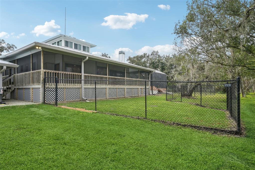 13221 North Branch Road Sarasota, FL 34240 - Photo 44 of 64 a view of a backyard with a garden and entertaining space