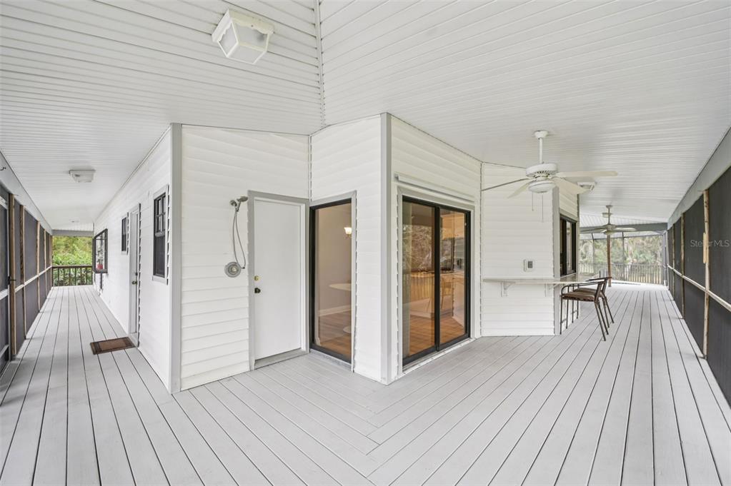 13221 North Branch Road Sarasota, FL 34240 - Photo 53 of 64 a view of outdoor space with wooden floor and seating