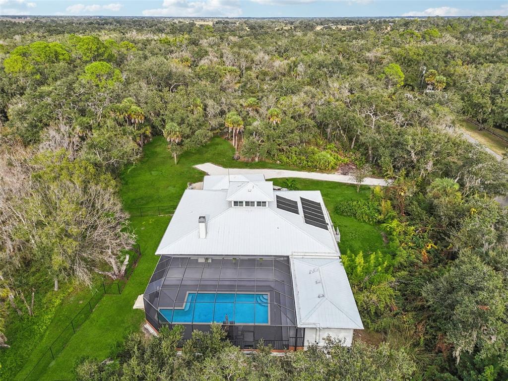 13221 North Branch Road Sarasota, FL 34240 - Photo 60 of 64 an aerial view of a house with yard