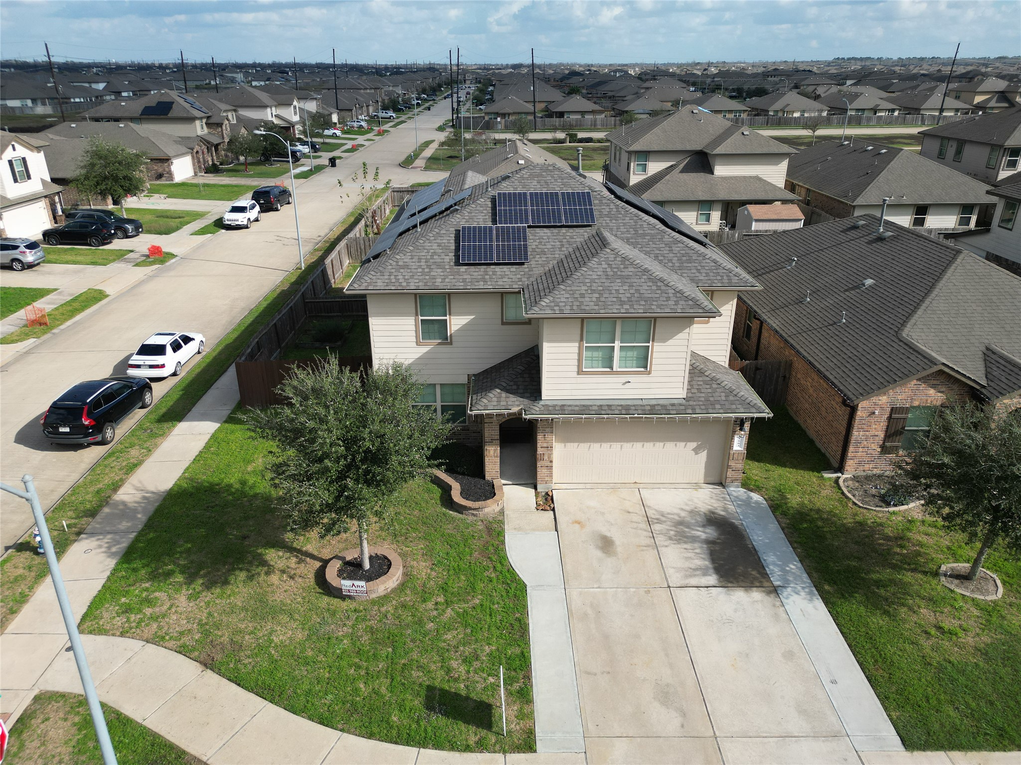 an aerial view of a house with swimming pool