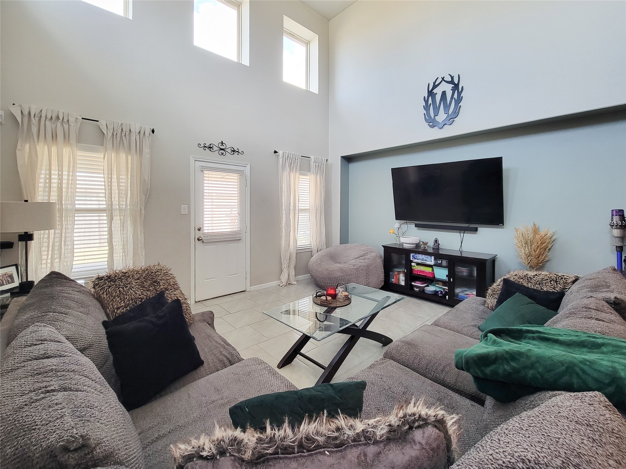 8003 Ecru Lane Rosharon, TX 77583 - Photo 11 of 35 a living room with furniture and a flat screen tv
