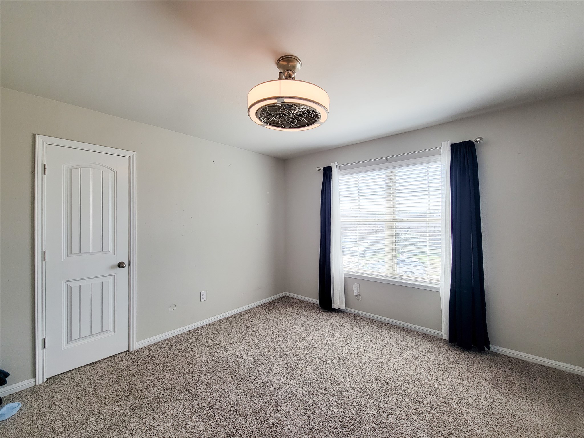 8003 Ecru Lane Rosharon, TX 77583 - Photo 26 of 36 a view of an empty room with a window