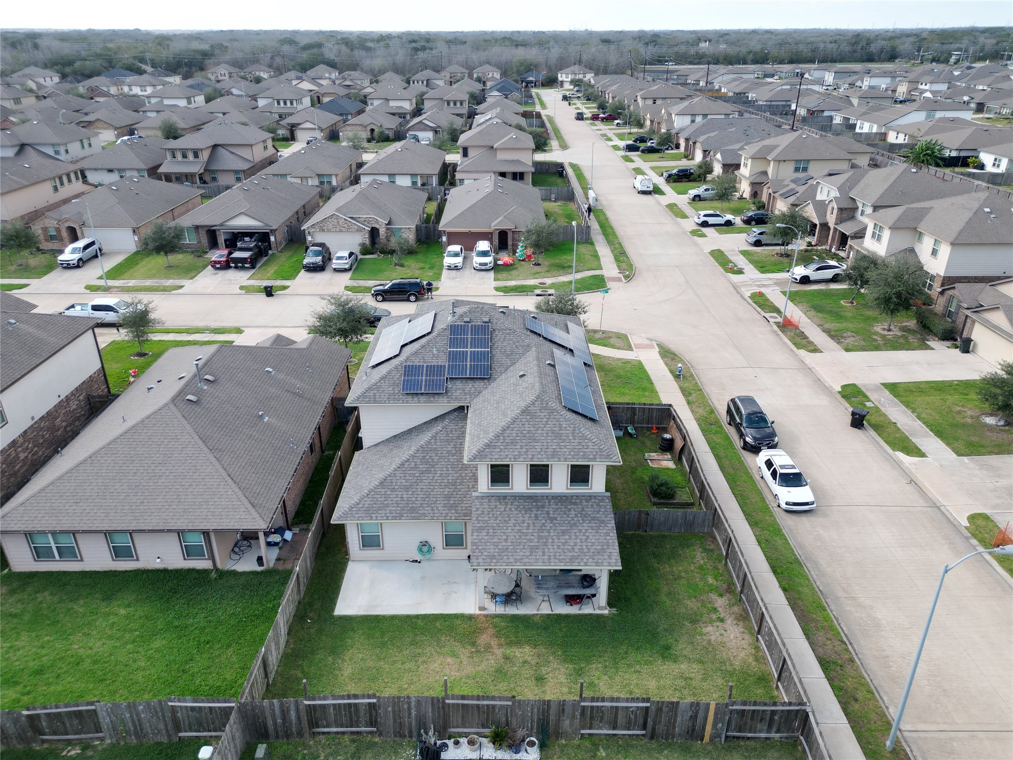 8003 Ecru Lane Rosharon, TX 77583 - Photo 32 of 36 an aerial view of residential houses with outdoor space and swimming pool