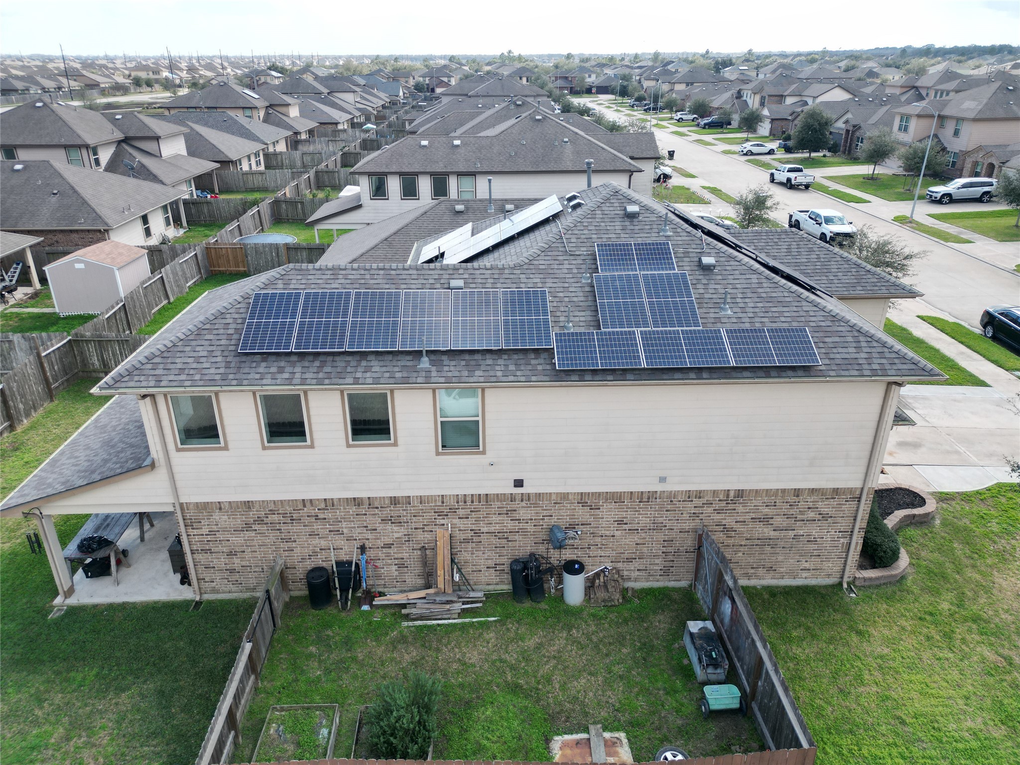 8003 Ecru Lane Rosharon, TX 77583 - Photo 4 of 36 an aerial view of a house with garden